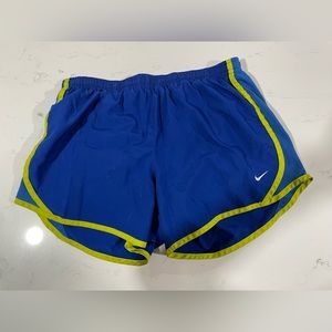 Blue Nike running shorts
